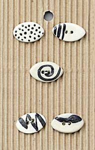Incomparable Buttons L279 5 black & white oval buttons